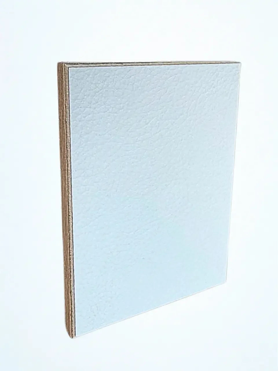 Riga Leather_White_Birch Plywood sample upright on a white background