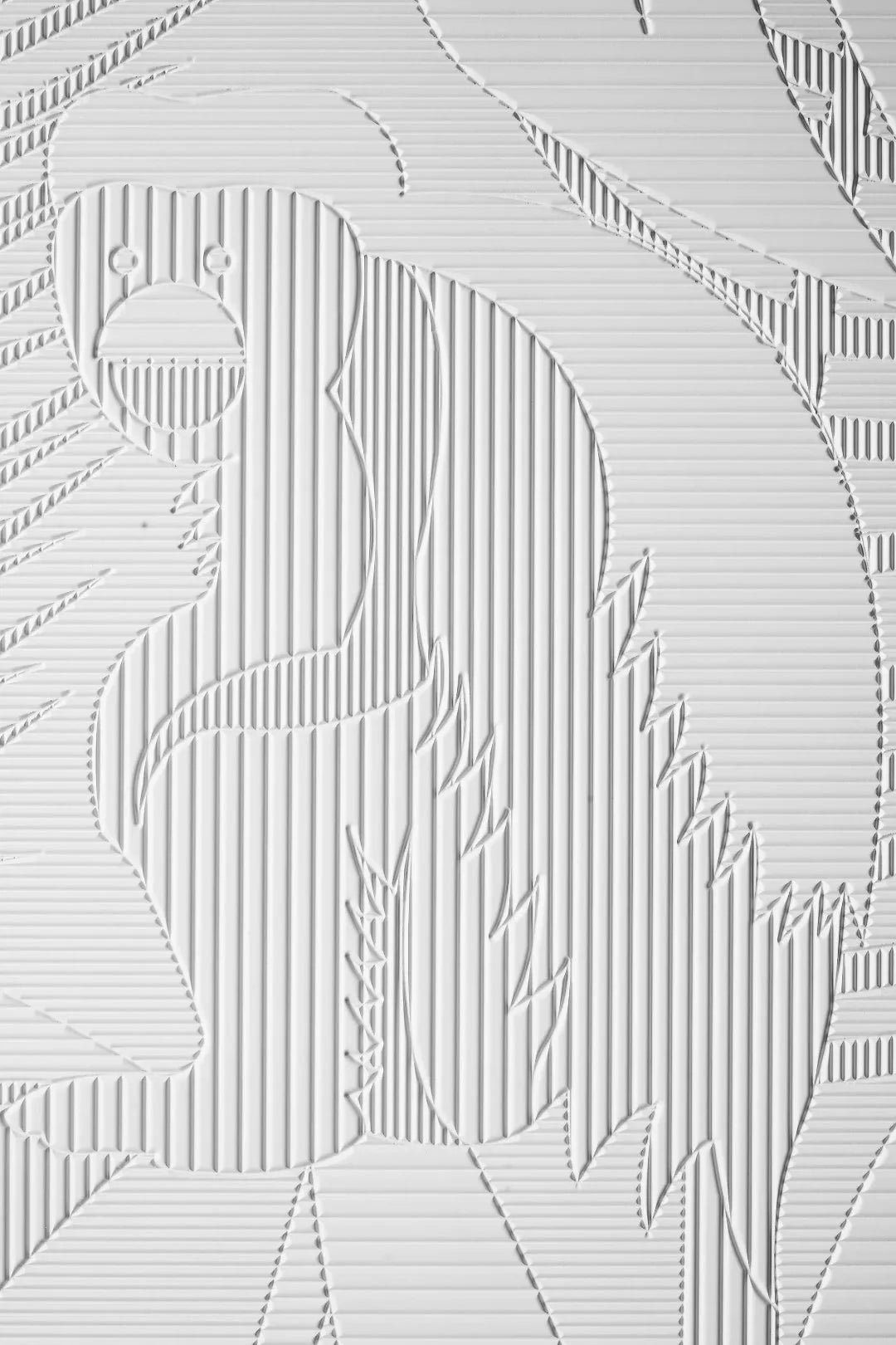Textured plywood panel with engraved monkey design, decorative wall cladding.