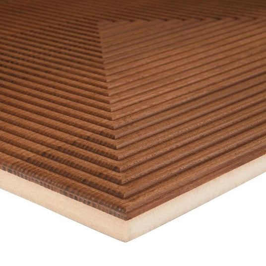Architectural plywood wall panel with geometric grooved pattern, close-up view