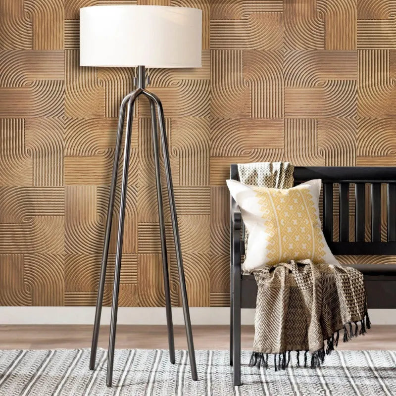 Decorative plywood wall panel with geometric carved pattern in a modern living room setting