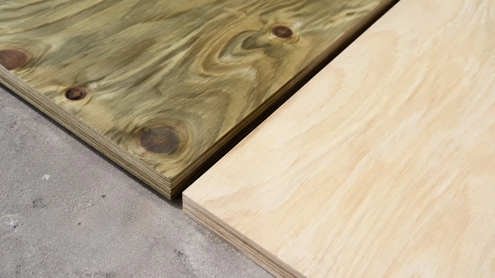 Treated and untreated plywood sheets on the concrete floore