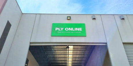 Warehouse exterior with green PLY ONLINE sign for plywood and cladding supplier
