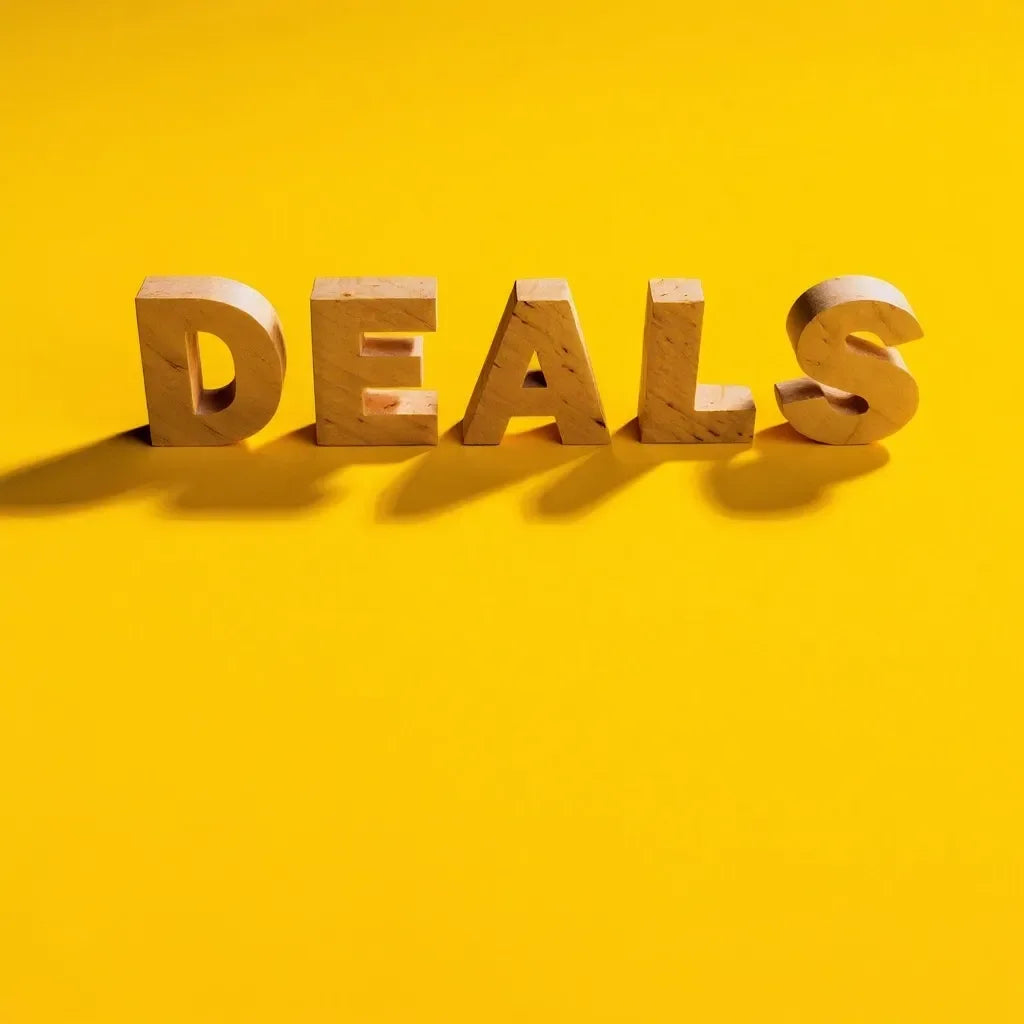 Wooden letters spelling DEALS on bright yellow background, plywood sales promotion