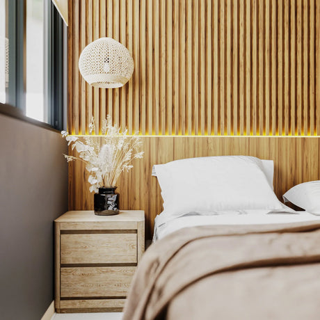 Modern bedroom with timber batten feature wall, wood bedside table, and soft lighting
