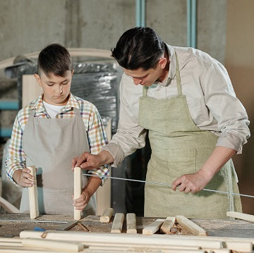 Student and a teacher in a woodworking class - Plywood Academy by Ply Online