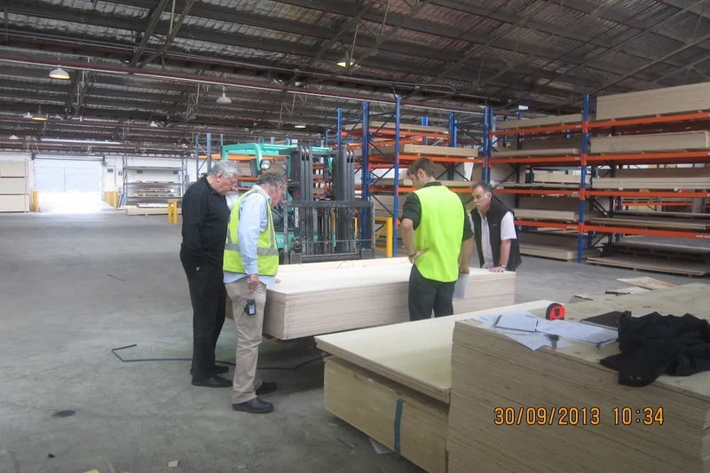 Mark Galperin and workers at Plyco warehouse, Fairfield, 2013